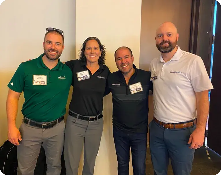 zizzl health team members together at an industry event