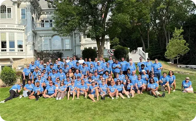 The zizzl health team gathered for a group photo outdoors