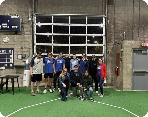 zizzl health team members at an indoor team outing